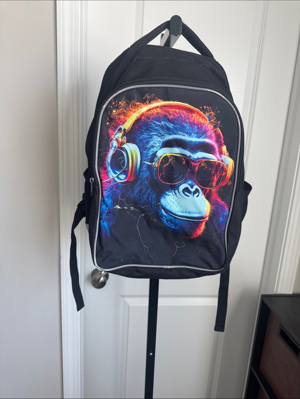 Black Headphones Graphic Backpack with Neon Blue & Orange Ape Print